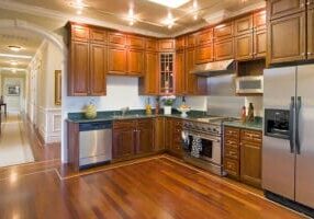 How Do I Choose the Right Materials and Finishes for Custom Kitchen Cabinets?